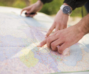 people-navigating-with-map-road-trip
