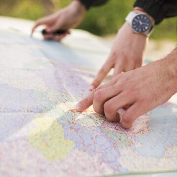 people-navigating-with-map-road-trip
